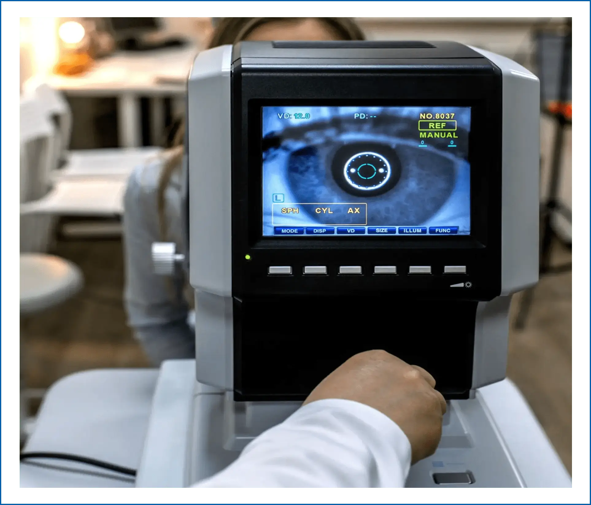 A person is looking at an eye on the screen.